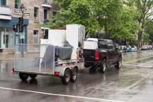 Towing a Trailer - Montreal, CANADA - 1 July 2017: Moving Day in Montreal. In Quebec, July 1 (Canada Day) is also known as Moving Day.