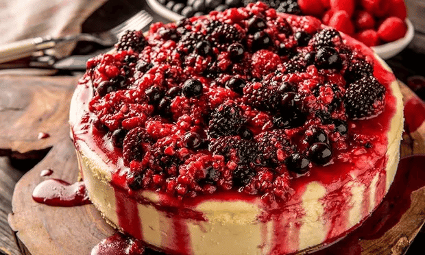 One of our Traeger dessert recipes, a summer berry cheesecake, cooked and plated.